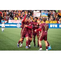 Detroit City FC reacts following a goal