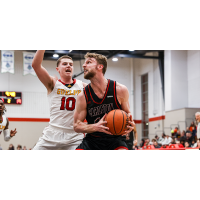 Forward Grant Shephard (right) with the Carleton University Ravens