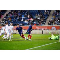 Chicago Fire FC defender Kendall Burks reacts after a goal against Chicago House AC