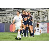 North Carolina Courage forward Tess Boade celebrates with teammates after scoring