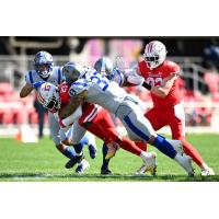 St. Louis Battlehawks linebacker Tré Watson makes a tackle against the D.C. Defenders