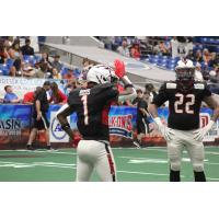 Jacksonville Sharks defensive back Marvin Ross and FB/LB Brandon Munoz