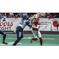 Northern Arizona Wranglers carry the ball against the Frisco Fighters