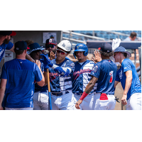 Diego Cartaya celebrates in the Tulsa Drillers dugout after his two-run homer