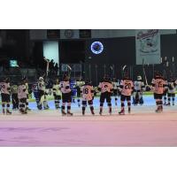 Wenatchee Wild players gather at center ice to salute the crowd