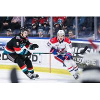 Carter Kowalyk of the Kelowna Rockets and Andrew Cristall of the Spokane Chiefs