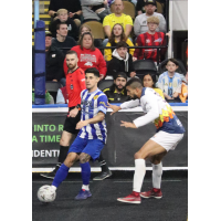 Milwaukee Waves' Mario Alvarez and Tacoma Stars' Tyler John in action