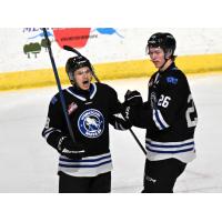 Wenatchee Wild forward Shaun Rios (left) lets out a roar after scoring in the third period