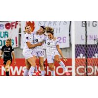 Racing Louisville FC reacts after a goal