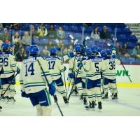 Swift Current Broncos gather after defeating the Vancouver Giants